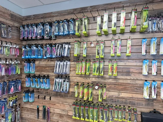 Wall display of packaged fishing lures