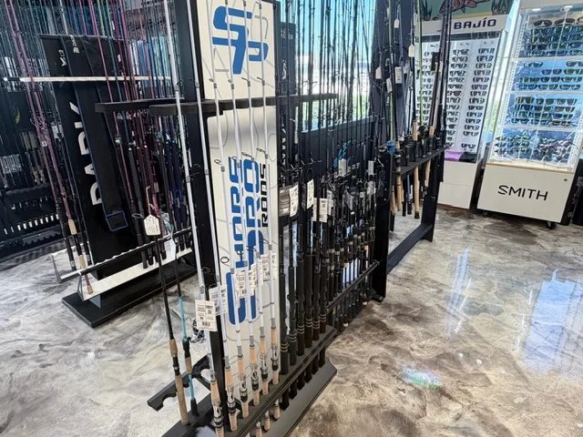 Fishing rods standing in floor racks