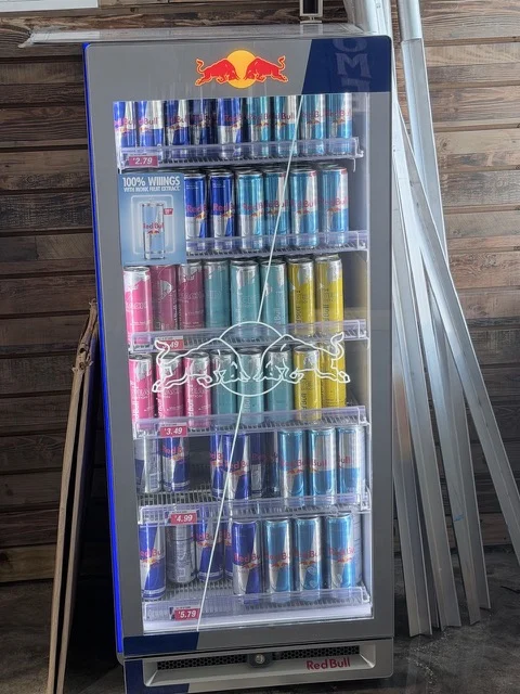 Refrigerated drinks display inside the shop