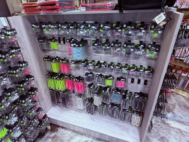 Fishing tackle displayed on a corner pegboard