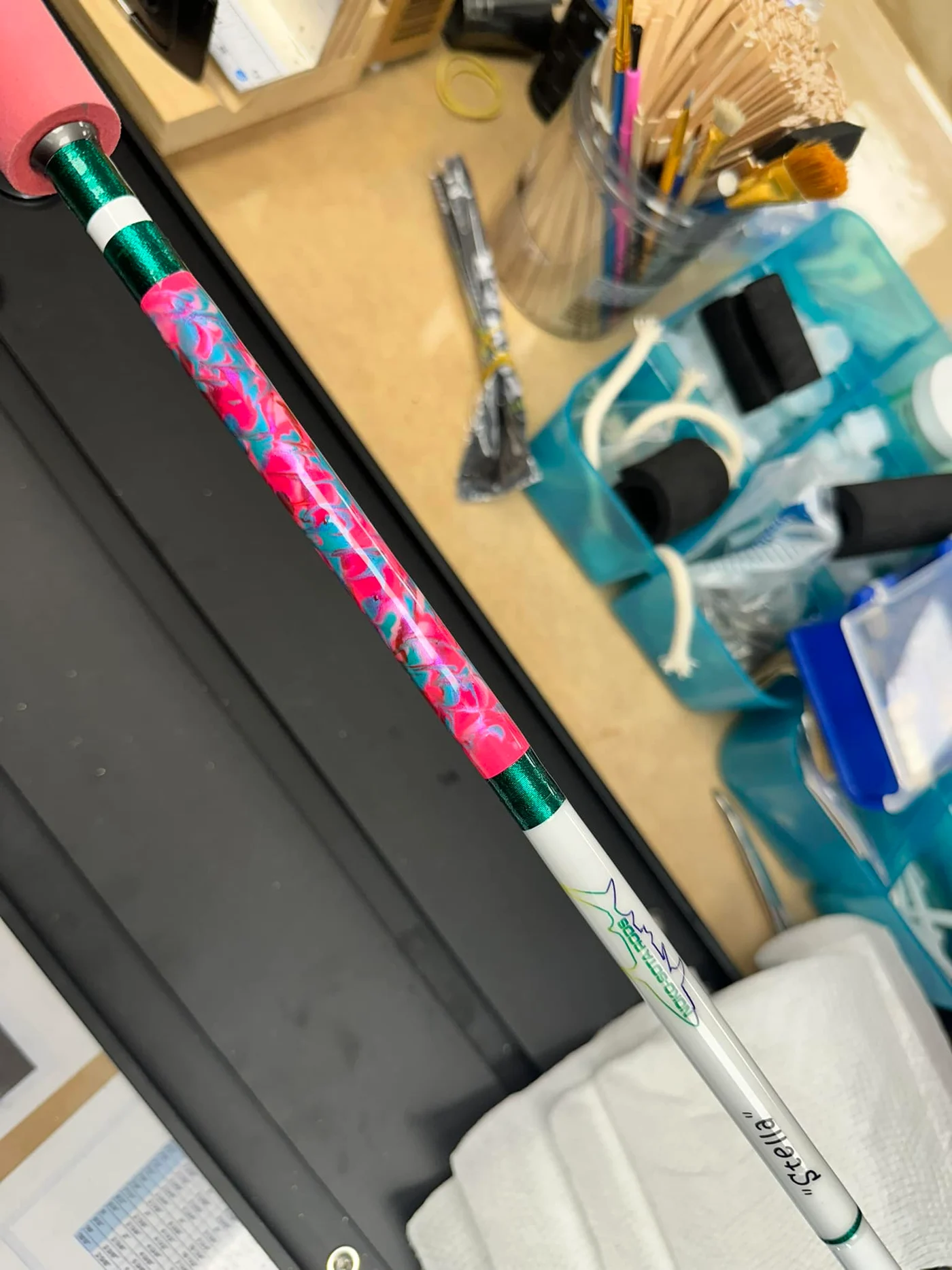 A custom fishing rod wrapping detail from Reel Quality SRQ’s service gallery.