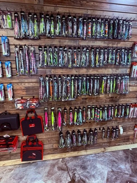 Jigs and lures on the Reel Quality SRQ shop wall