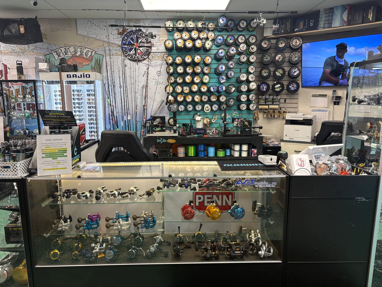Fishing rods, reels, tackle, and fishing line inside Reel Quality SRQ
