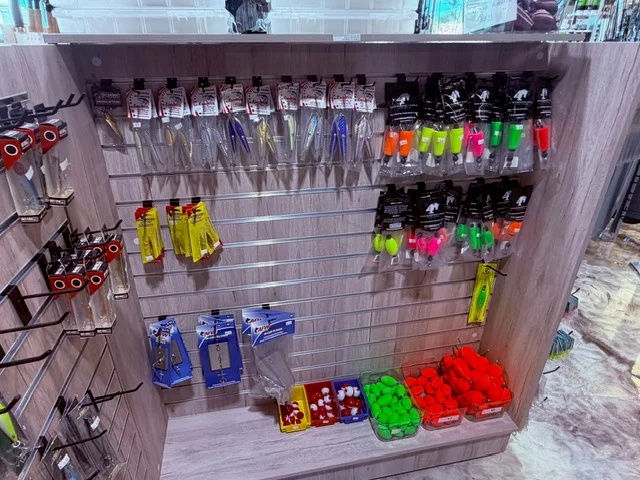 Terminal tackle and packaged fishing accessories inside Reel Quality SRQ