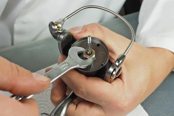 Inspection of a fishing reel with the spool removed
